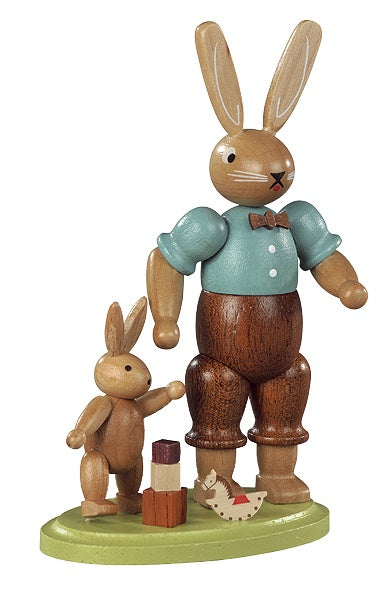 Easter bunny, male with playing child